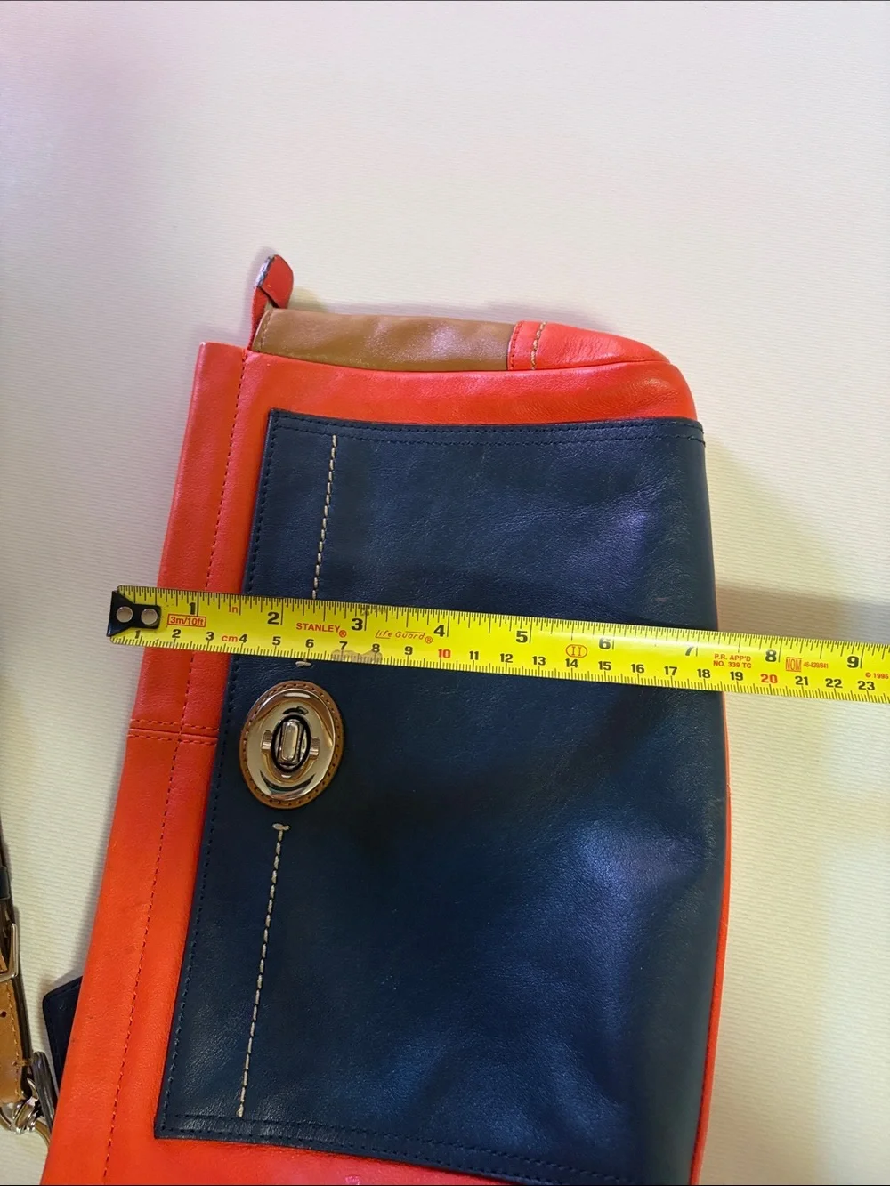 Coach Colorblock Leather Wristlet in Navy, Coral & Tan